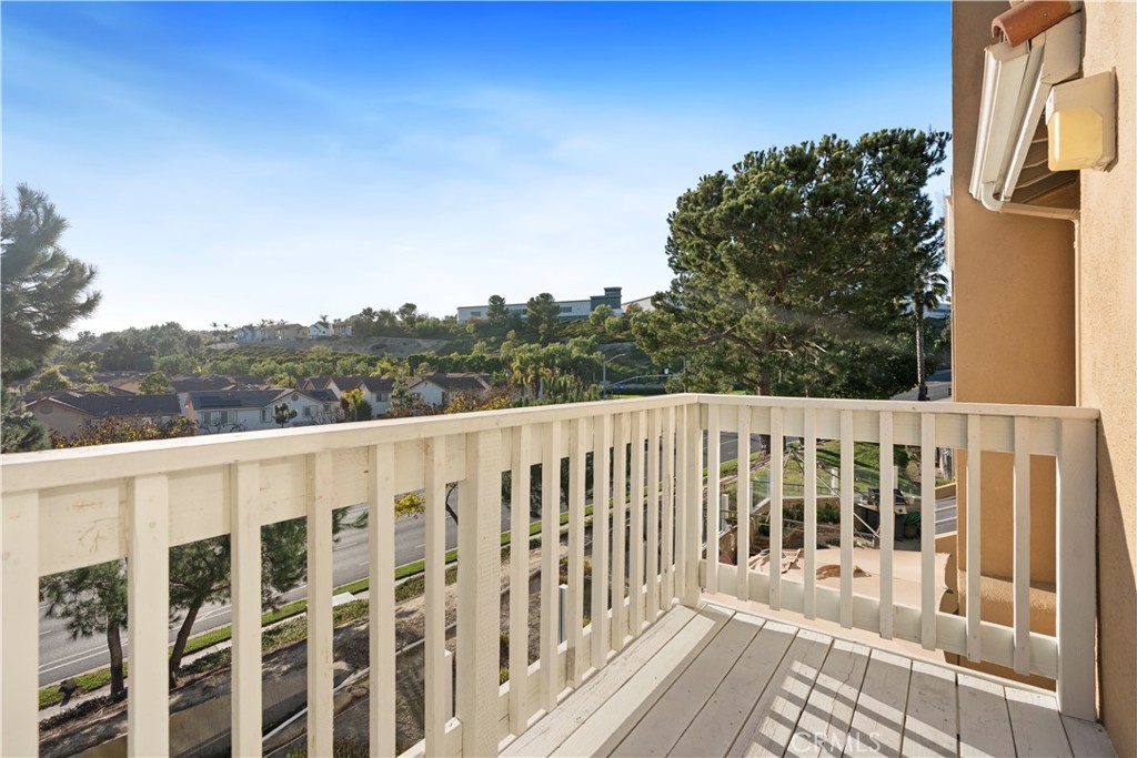 33 Gauguin Circle Aliso Viejo, CA 92656 - Photo 36 of 49 a view of a balcony with wooden floor