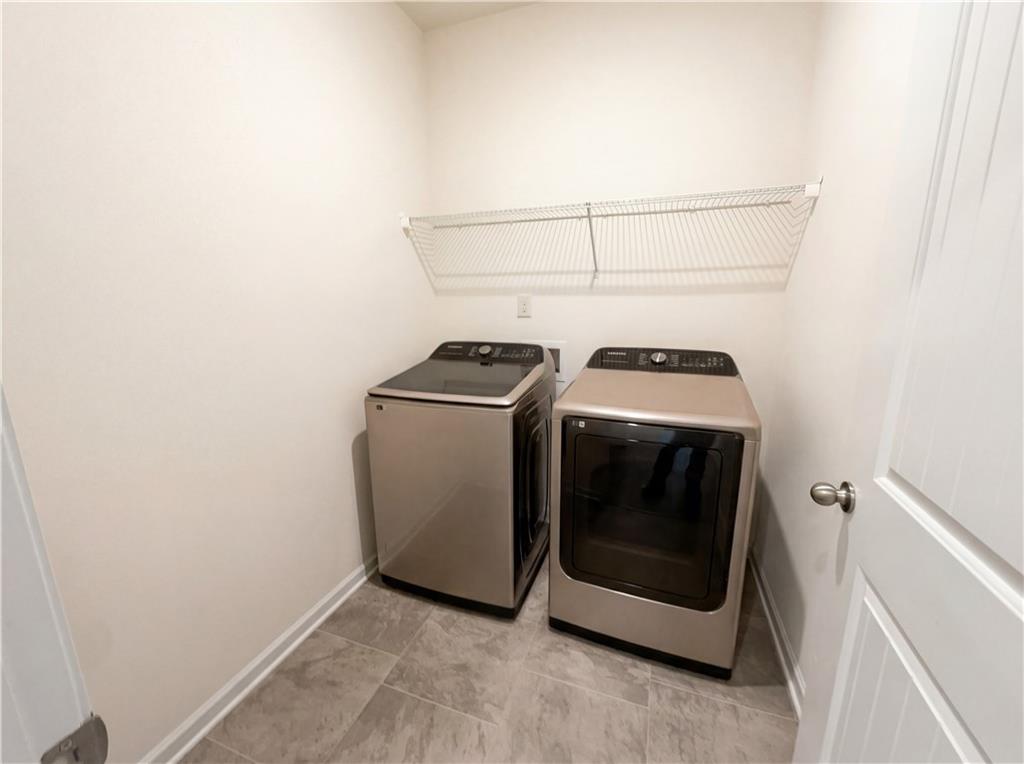 2682 North Broad Street Extension Northeast Rome, GA 30161 - Photo 17 of 23 a utility room with dryer and washer