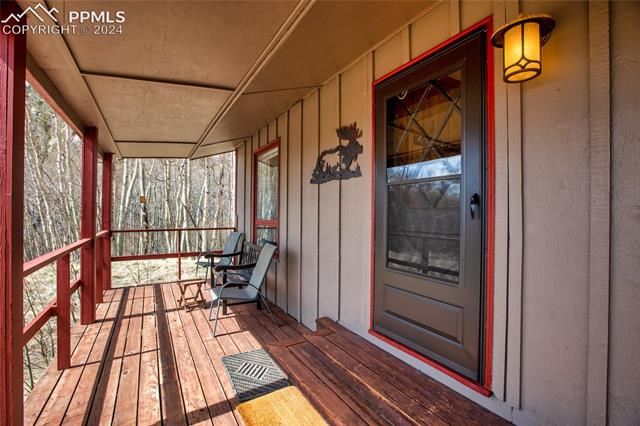771 Topaz Road Lake George, CO 80827 - Photo 2 of 40 Front entry and covered porch area.
