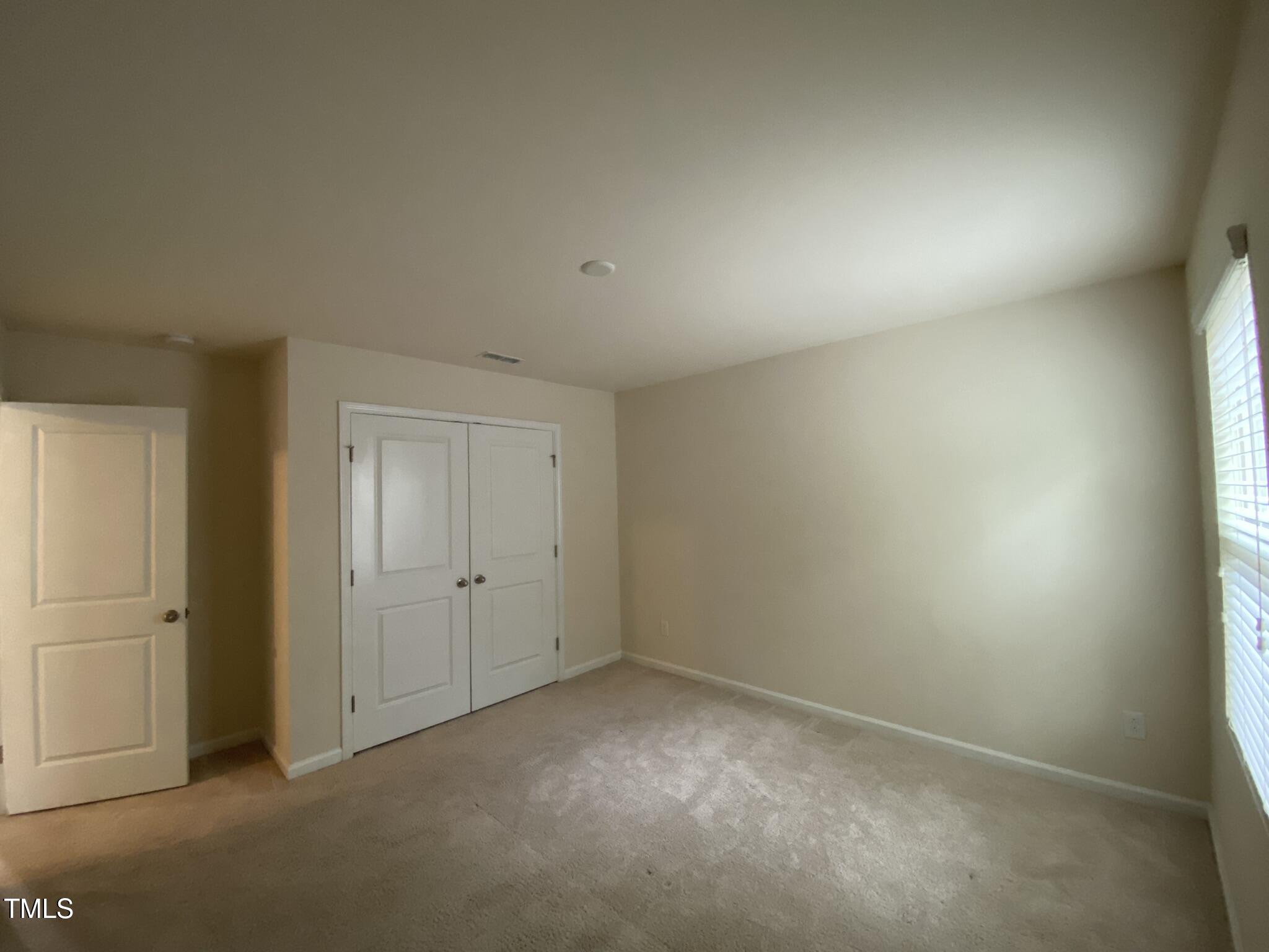 3545 Massey Ridge Court Raleigh, NC 27616 - Photo 22 of 38 an empty room with closet area