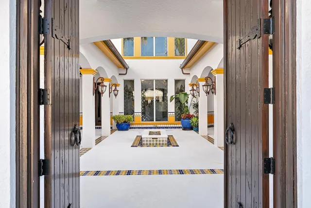 a very nice looking dining room with a table and chairs