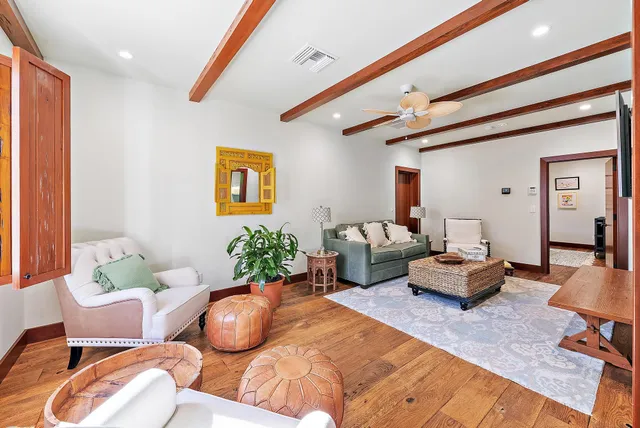 a bedroom with furniture and a window