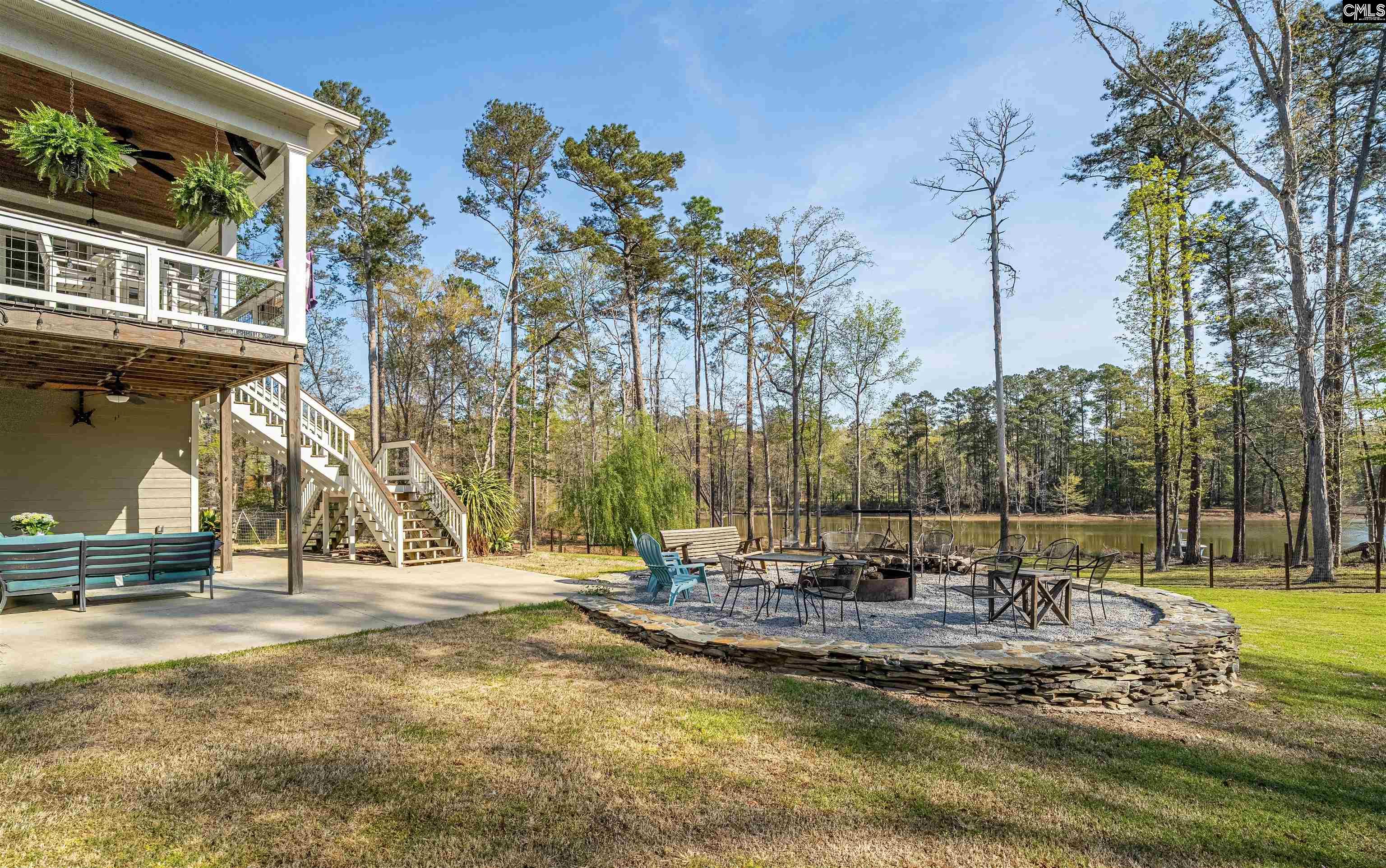649 Sandbar Road Chapin, SC 29036 - Photo 28 of 40 a view of a swimming pool with a patio