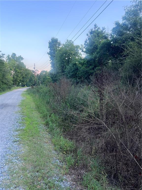 7070 Sofkee Place Macon, GA 31216 - Photo 7 of 8 a big yard with lots of green space