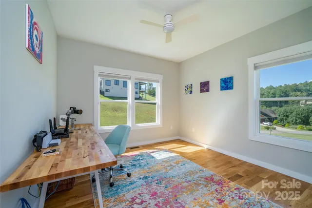 a workspace with furniture and window