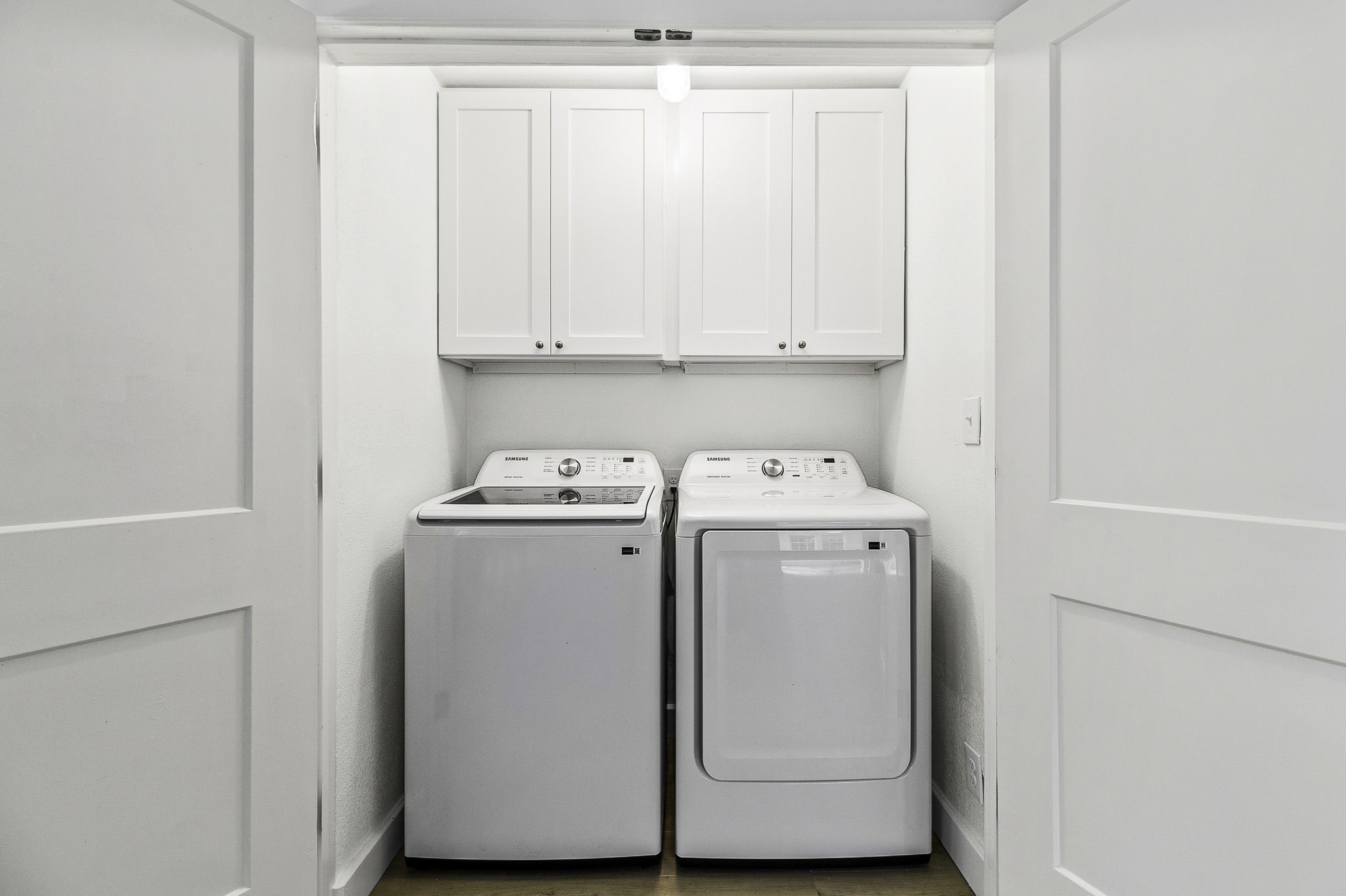 600 Wilderness Road Point Blank, TX 77364 - Photo 24 of 28 Functional laundry room offering practical storage and everyday convenience.