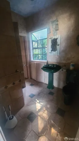 a kitchen with a sink and a window