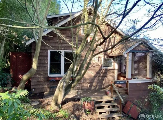 a kitchen with a stove and a refrigerator