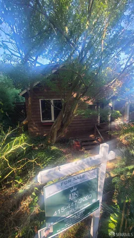 a view of backyard with green space