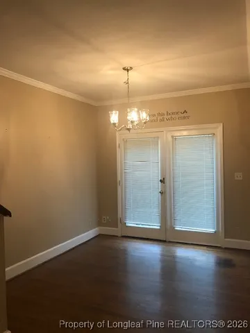 a sink with wooden cabinets
