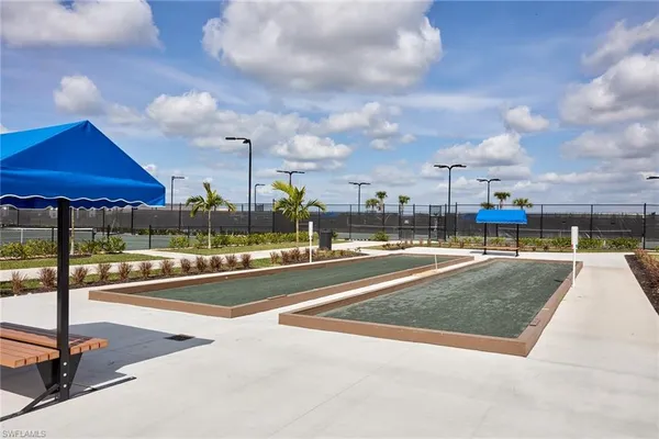 a view of a swimming pool with a patio