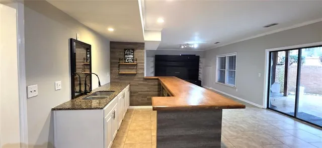 a bathroom with a toilet and a shower curtain