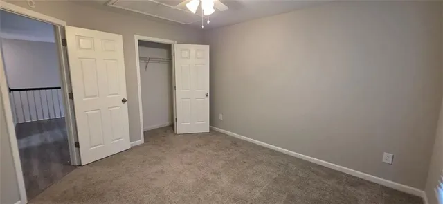 an empty room with a bathroom