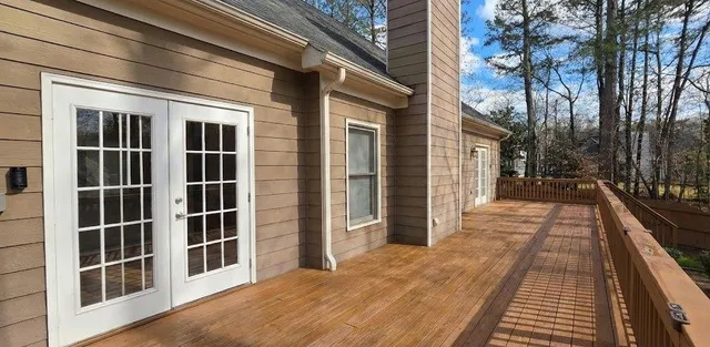 a view of house with outdoor seating area