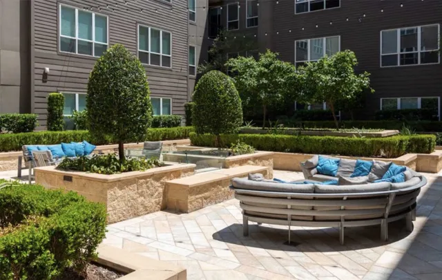 a view of a swimming pool with back yard