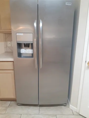 a bathroom with a mirror