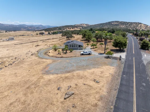 a view of a beach with a mountain