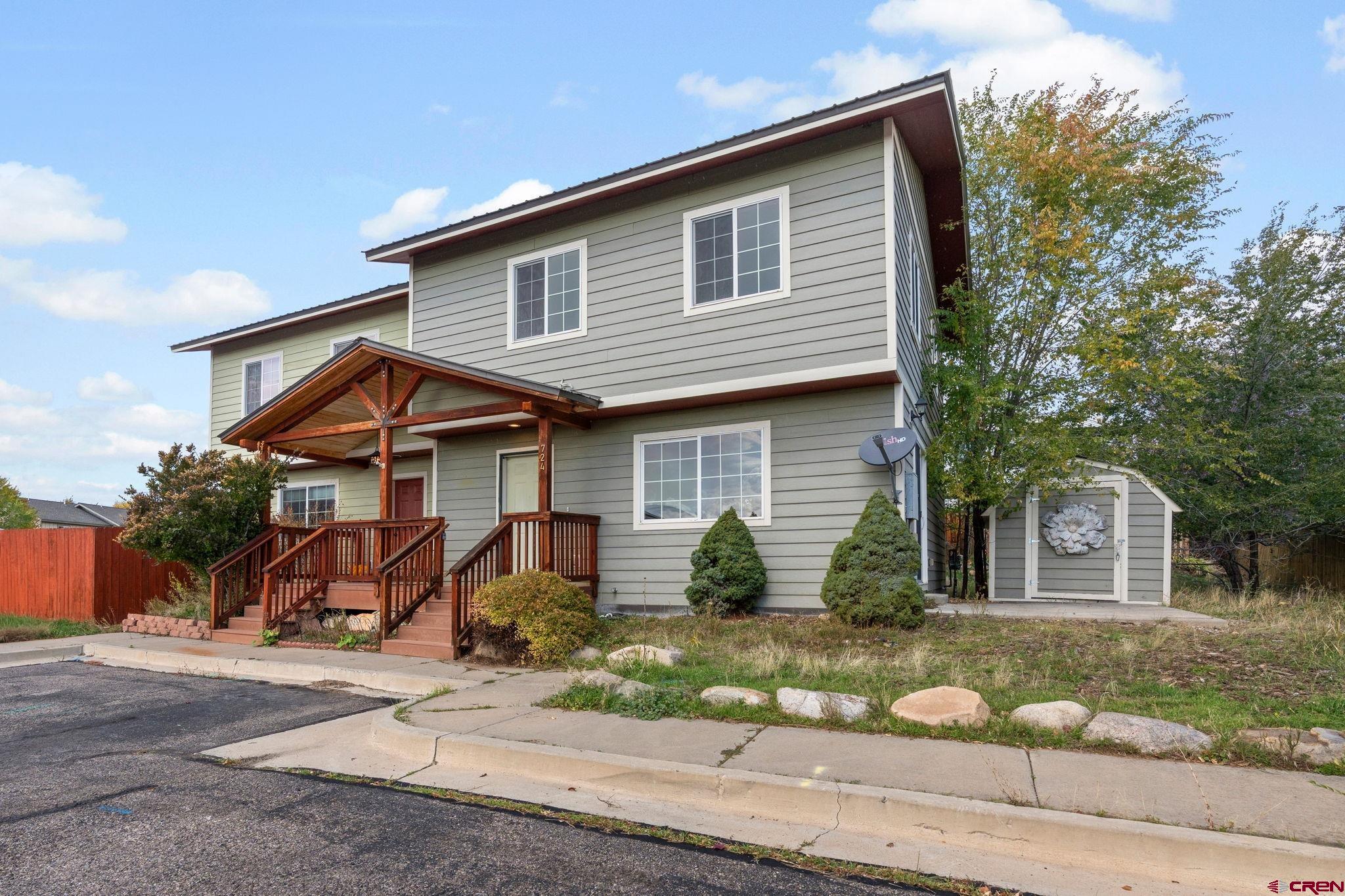 front view of a house with a small yard