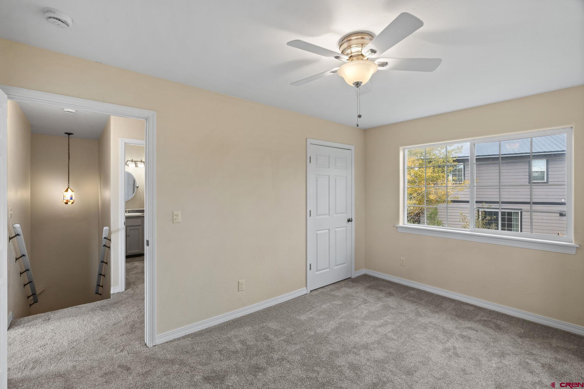 724 Jacobs Lane Bayfield, CO 81122 - Photo 18 of 33 a view of an empty room with a window