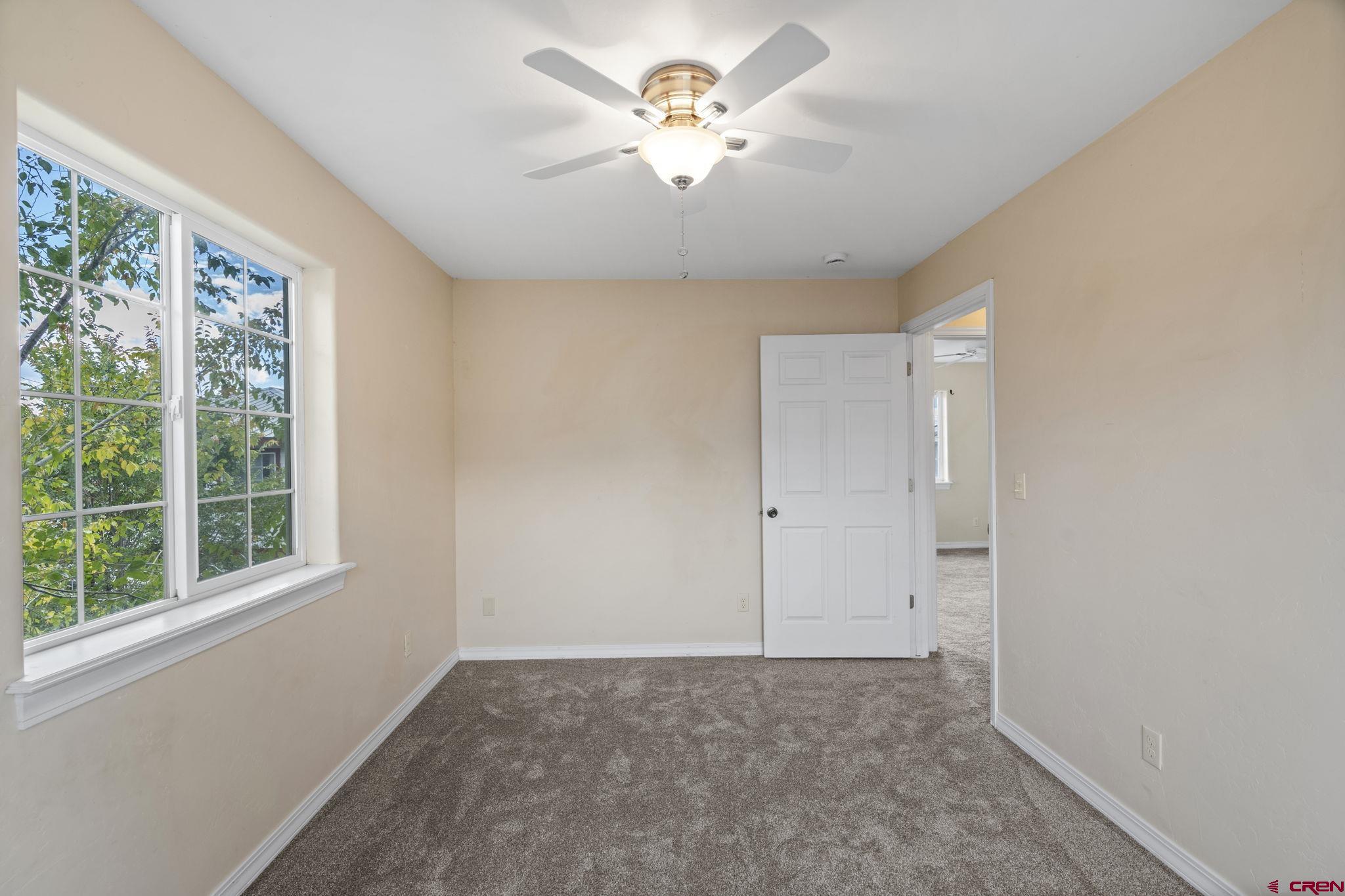 724 Jacobs Lane Bayfield, CO 81122 - Photo 19 of 33 a view of an empty room with a window