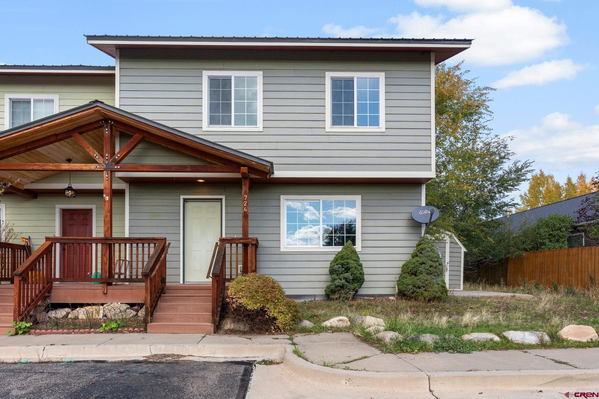 724 Jacobs Lane Bayfield, CO 81122 - Photo 2 of 33 a front view of a house with garden