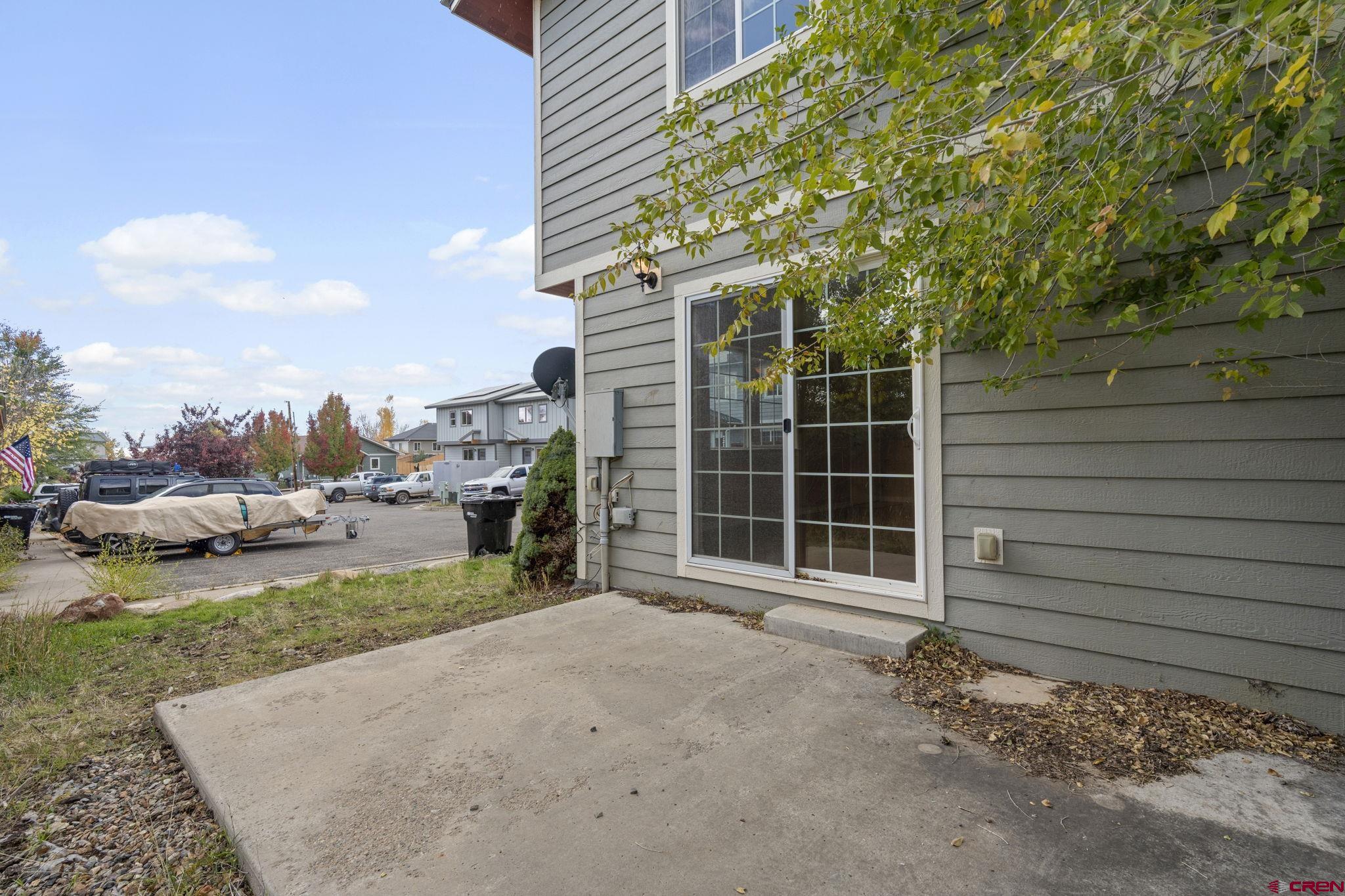 724 Jacobs Lane Bayfield, CO 81122 - Photo 28 of 33 a view of a house with a yard and garage