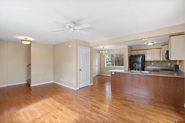 a view of kitchen with wooden floor