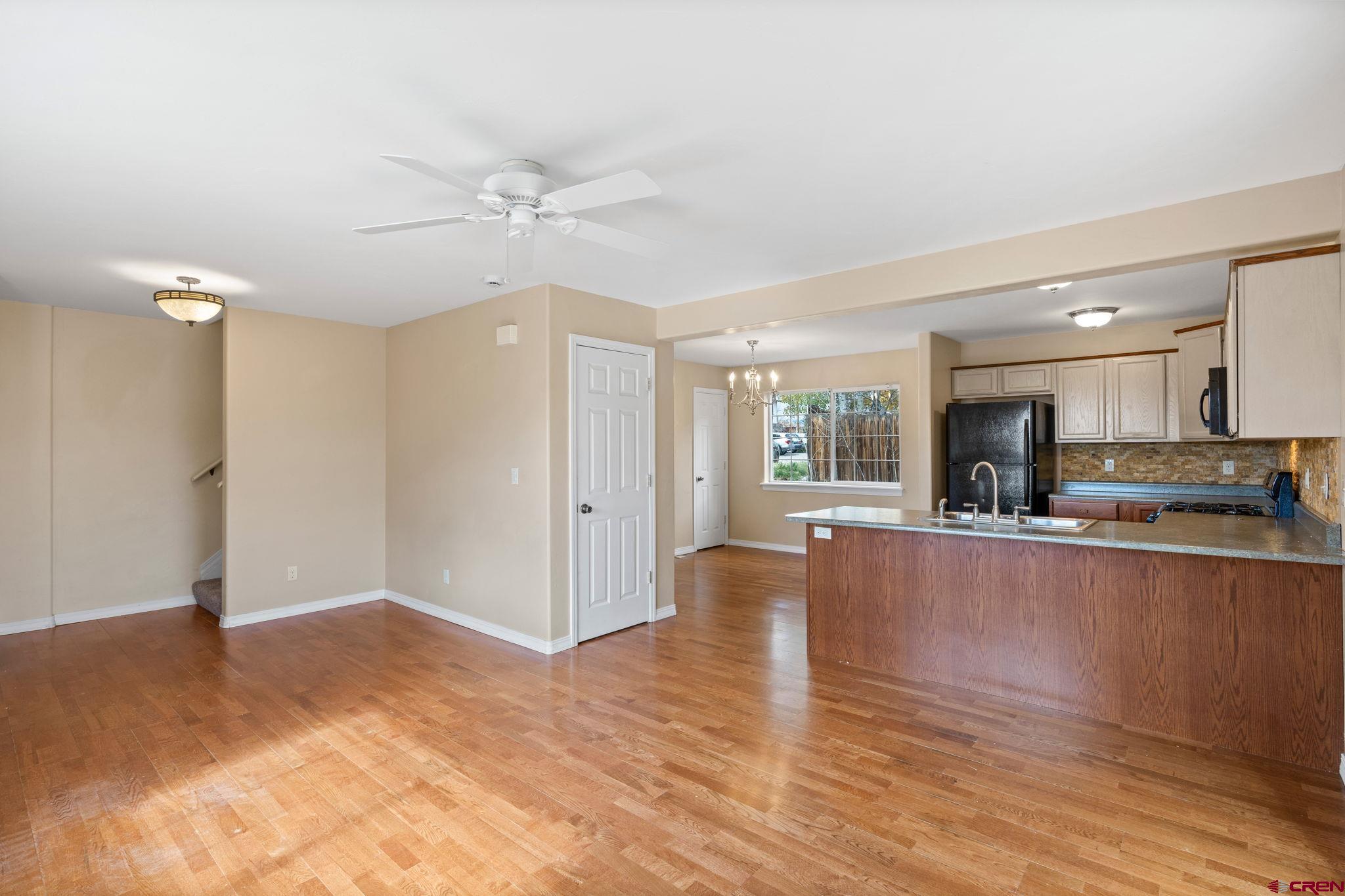 724 Jacobs Lane Bayfield, CO 81122 - Photo 6 of 33 a view of kitchen with wooden floor