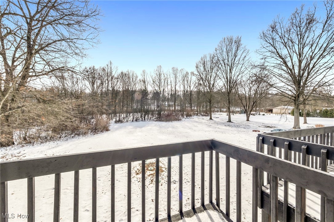 2928 Pressler Road Uniontown, OH 44685 - Photo 16 of 34 Snow covered deck with a balcony
