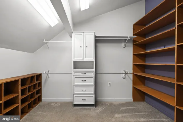 a kitchen that has a lot of cabinets in it