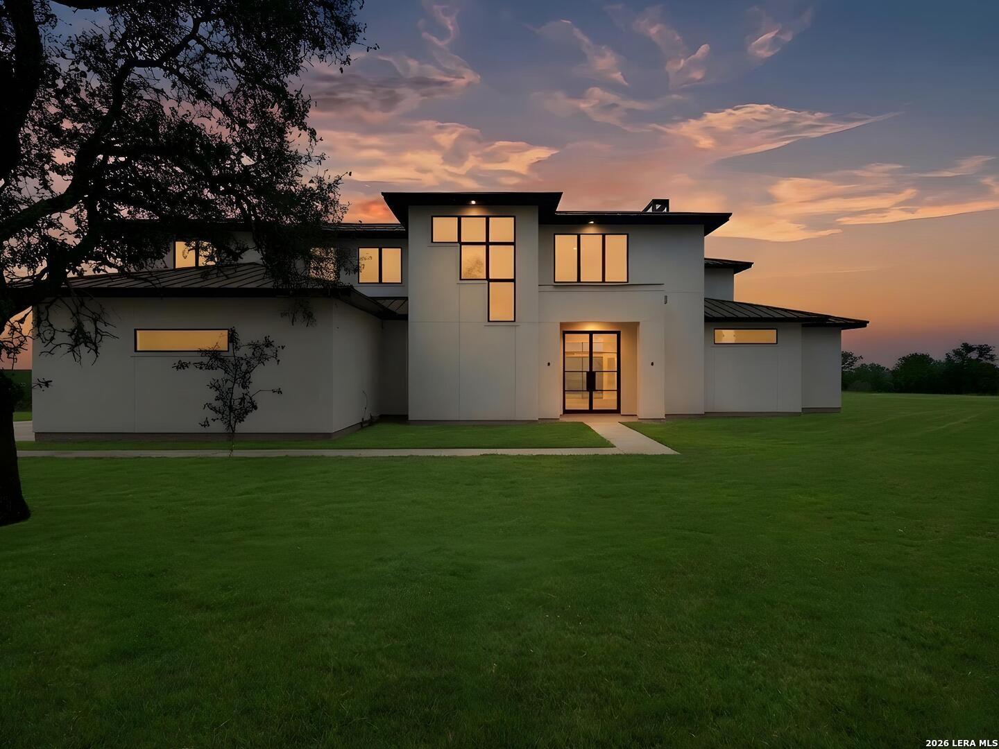 1053 Brewer Rdg Road Bulverde, TX 78163 - Photo 2 of 37 a house view with a garden space