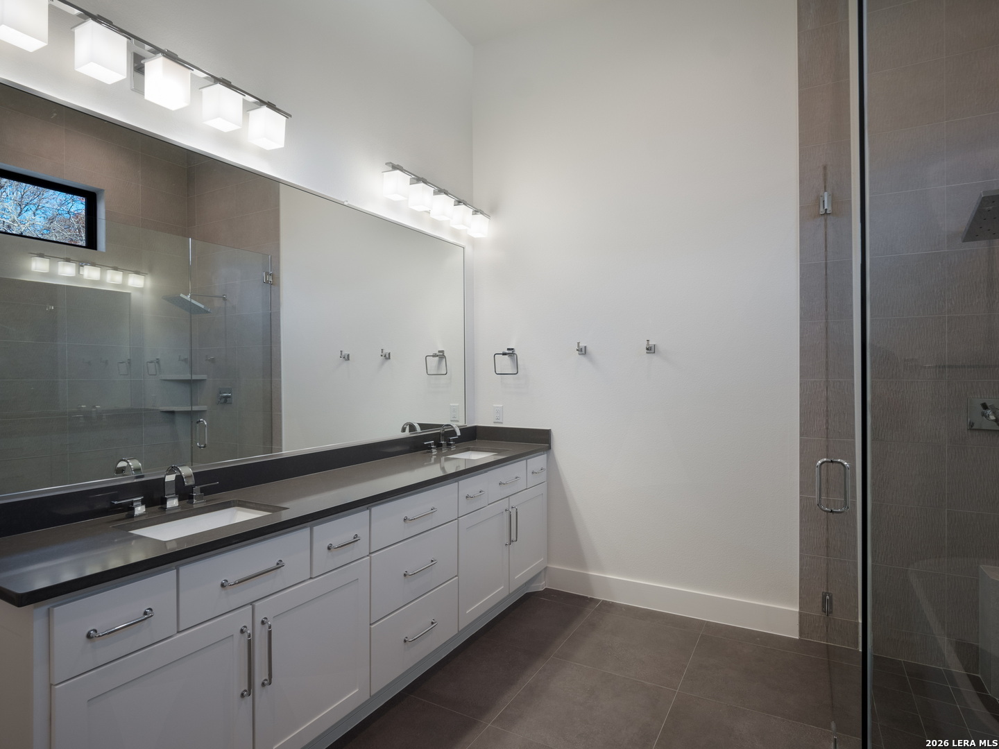 1053 Brewer Rdg Road Bulverde, TX 78163 - Photo 30 of 37 a spacious bathroom with a granite countertop sink a mirror and a