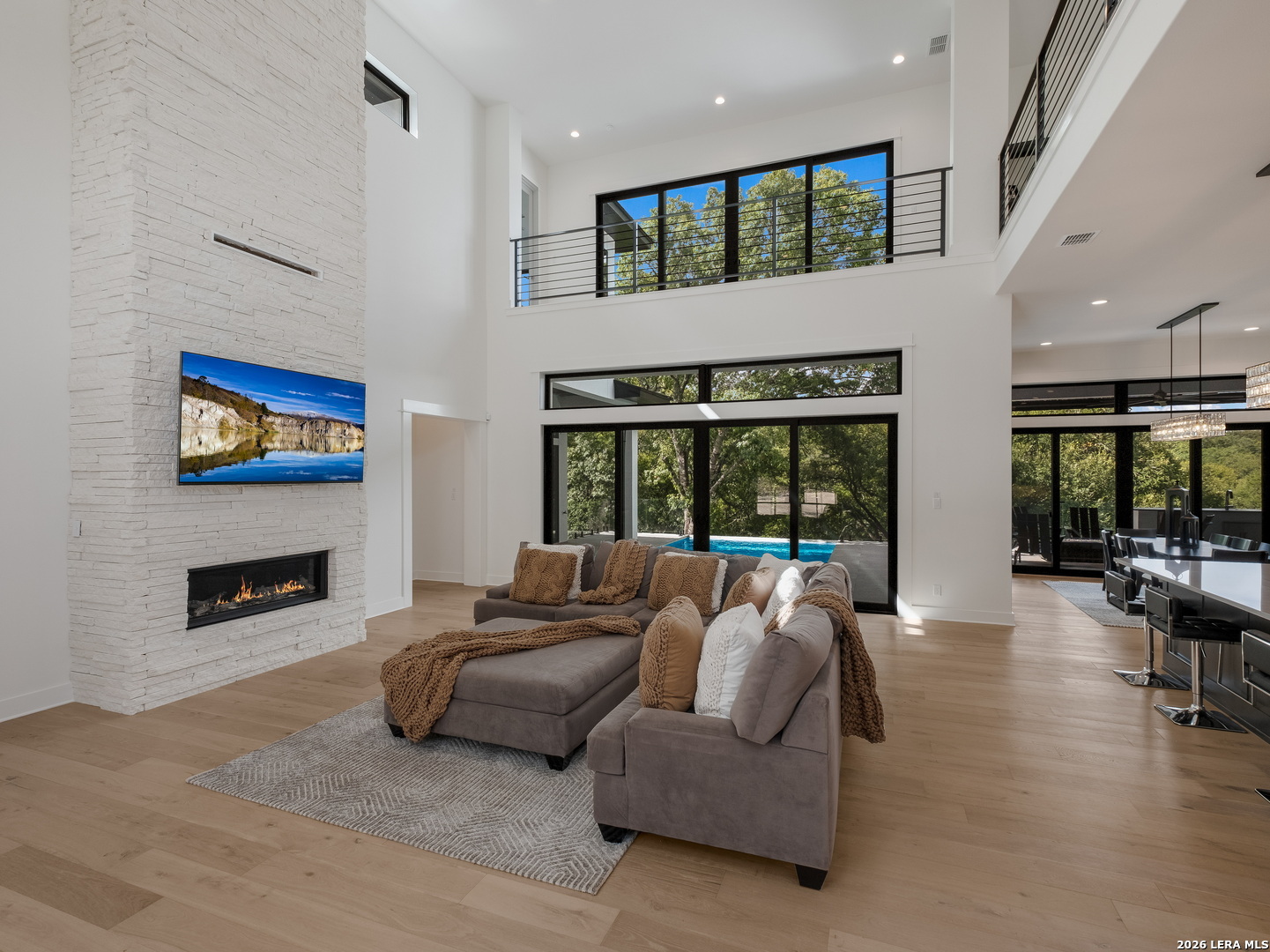 1053 Brewer Rdg Road Bulverde, TX 78163 - Photo 4 of 37 a living room with furniture and a fireplace
