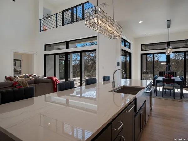a kitchen with counter top space and stainless steel appliances