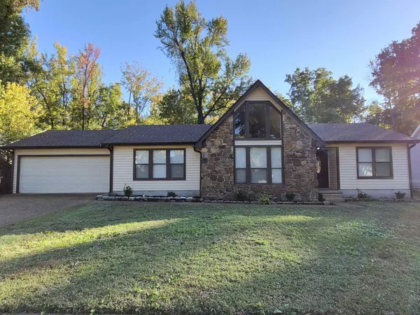 a house view with a garden space