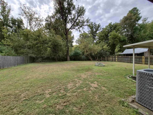 a view of a garden with a entertaining space