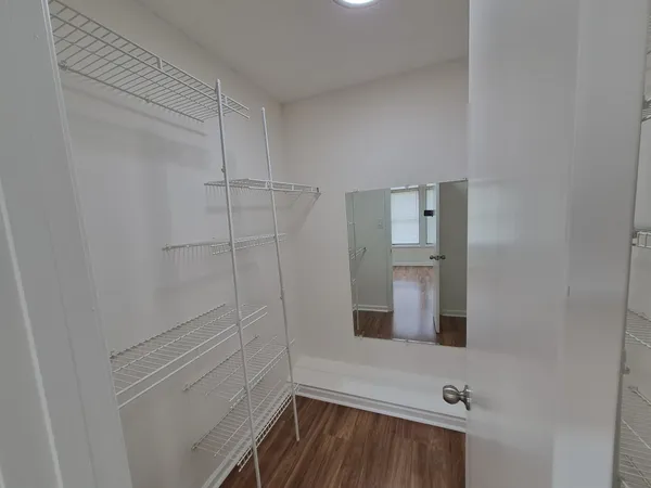 a bathroom with a bathtub and shower