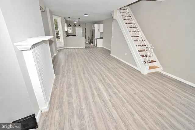 a view of livingroom with furniture and wooden floor