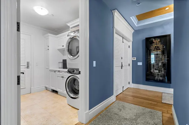 a view of a house with backyard sitting area and garden