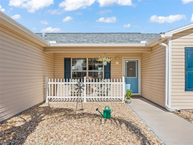a front view of a house with a porch