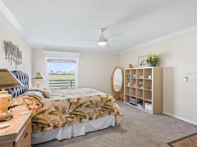 a bedroom with a bed with closet