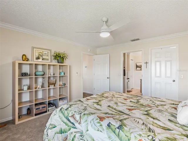 a bedroom with a bed and closet