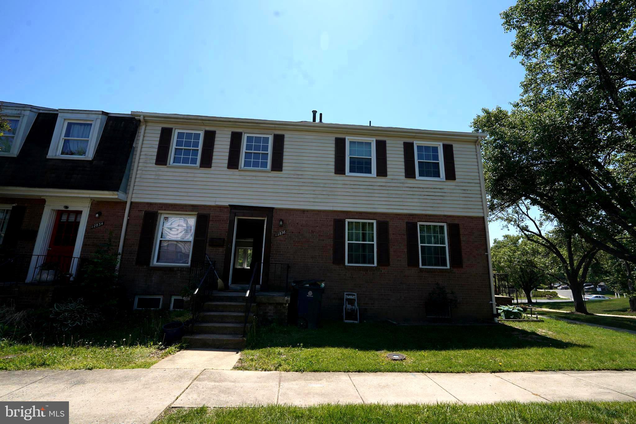 12836 Claxton Drive, Unit 4E Laurel, MD 20708 - Photo 2 of 13 a house view with a garden space