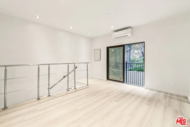 a bathroom with a sink a toilet and bathtub