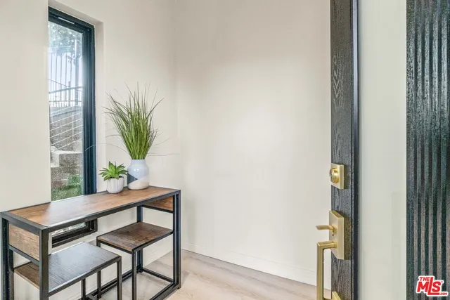 a view of a kitchen with furniture and cabinet