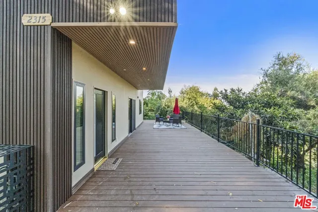 a chair and tables in the patio