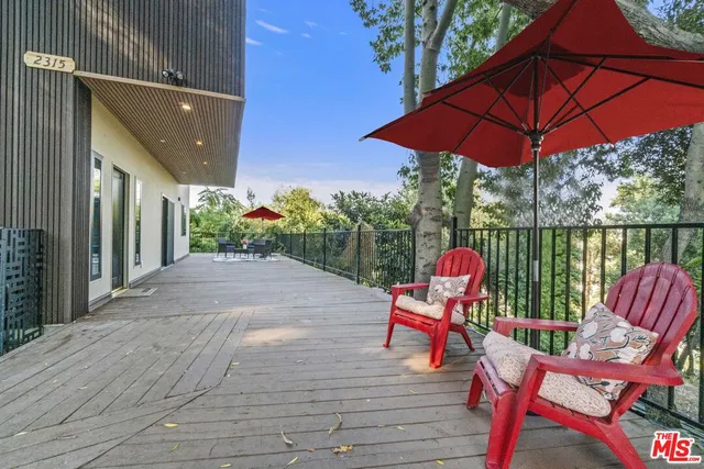 a view of a chairs and table on the terrace