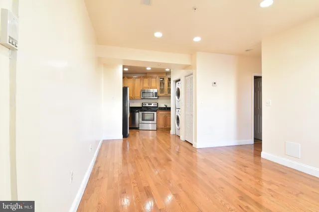 a view of kitchen with wooden floor