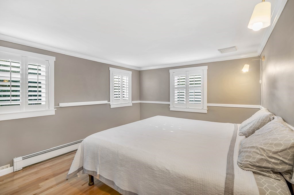 16 Fuller Road Billerica, MA 01821 - Photo 20 of 40 a bedroom with a bed and a window