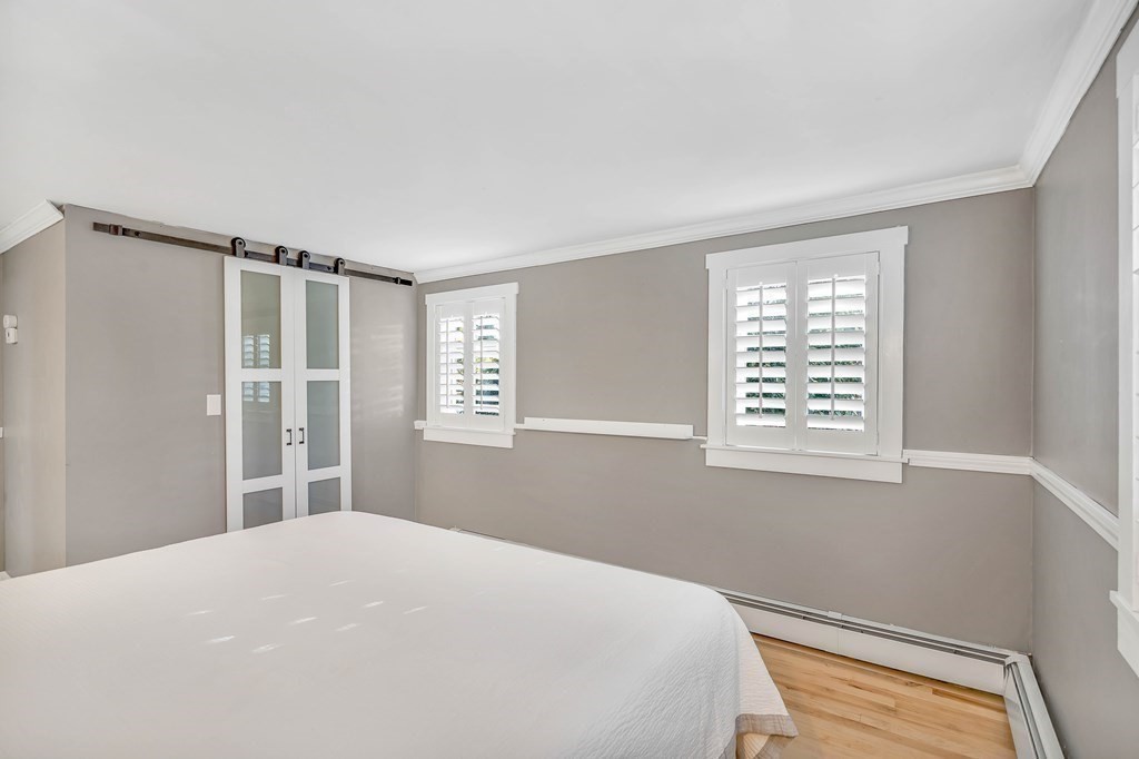 16 Fuller Road Billerica, MA 01821 - Photo 21 of 40 a bedroom with a bed and a window